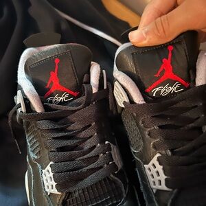 Jordan men's black sneakers with red Jumpman accents